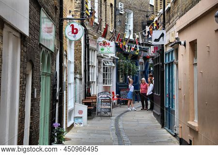 London, Uk - July 8, 2016: People Walk In Greenwich, London, Uk. Royal Borough Of Greenwich Is A Par