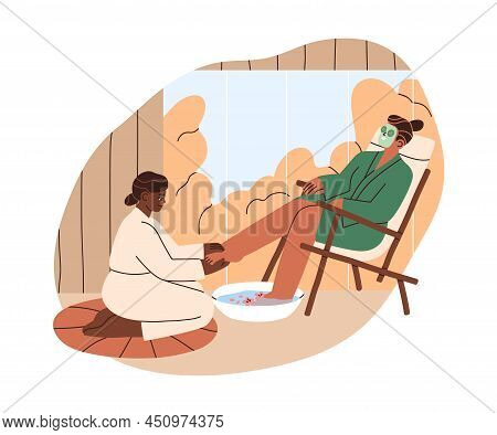 Woman Relaxing At Foot And Leg Massage And Bath In Spa Wellness Center. Person With Facial Mask, Sit