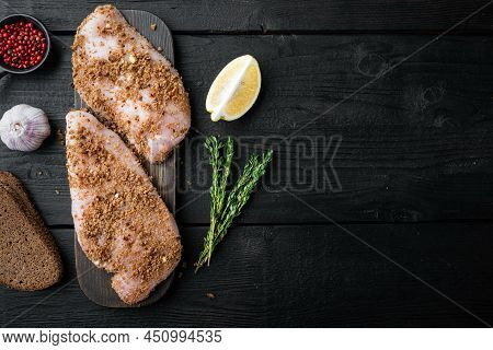 Crispy Garlicky Chicken Raw Ingredient, On Black Wooden Background, Top View  With Copy Space