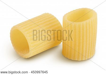 Raw Italian Pasta In Wooden Bowl Isolated On White Background With Clipping Path . Mezze Maniche Rig