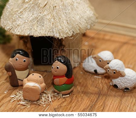 Miniature Nativity Set With The White Sheep And The Holy Family