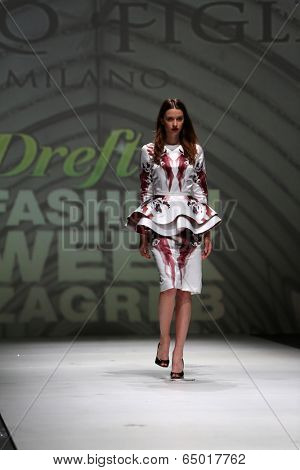 ZAGREB, CROATIA - MAY 09: Fashion model wearing clothes designed by Avaro Figlio on the Zagreb Fashion Week on May 09, 2014 in Zagreb, Croatia.