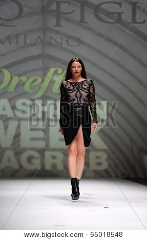 ZAGREB, CROATIA - MAY 09: Fashion model wearing clothes designed by Avaro Figlio on the Zagreb Fashion Week on May 09, 2014 in Zagreb, Croatia.