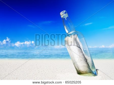 Message in a bottle on a beach.