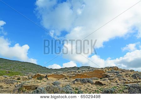 Clouds Over A Green Hill