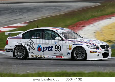 SEPANG, MALAYSIA - MAY 10, 2014: The BMW E90 car of Tin Sritrai takes to the track at the Thailand Super 2000 race of the Thailand Super Series Rd 1 in Sepang International Circuit.