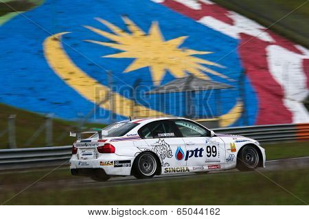 SEPANG, MALAYSIA - MAY 10, 2014: The BMW E90 car of Tin Sritrai takes to the track at the Thailand Super 2000 race of the Thailand Super Series Rd 1 in Sepang International Circuit.