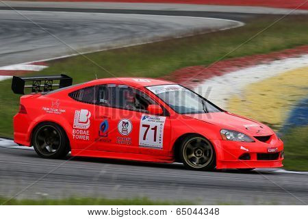 SEPANG, MALAYSIA - MAY 10, 2014:The Honda Integra car of Supachai Weeraborwornpong takes to the track at the Thailand Super 2000 race of the Thailand Super Series Rd 1 in Sepang International Circuit.