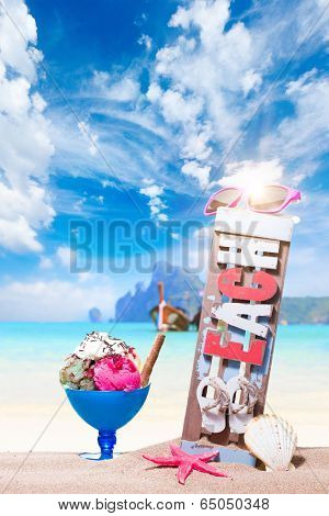 Gourmet tropical icecream dessert served alongside a sunny summer beach in an elegant dish