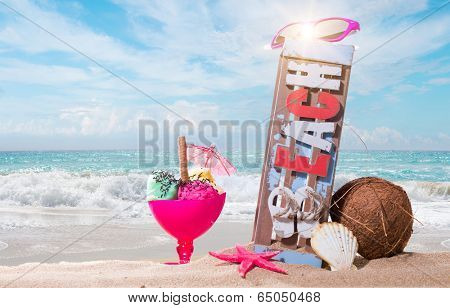 Gourmet tropical icecream dessert served alongside a sunny summer beach in an elegant dish