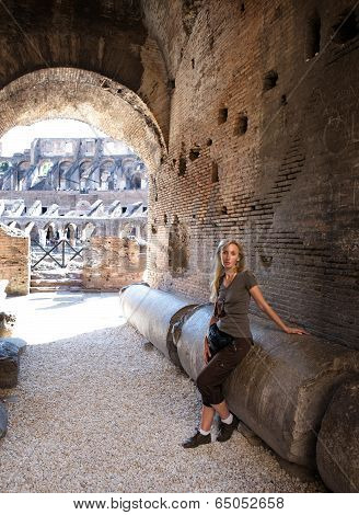 Italy. Rome. The tourist on ruins of the ancient Collosseo