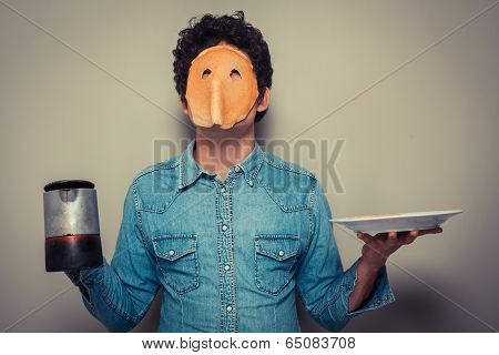 Man With Pancake On His Face And Coffee