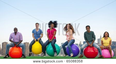 People having fun infront of city skyline