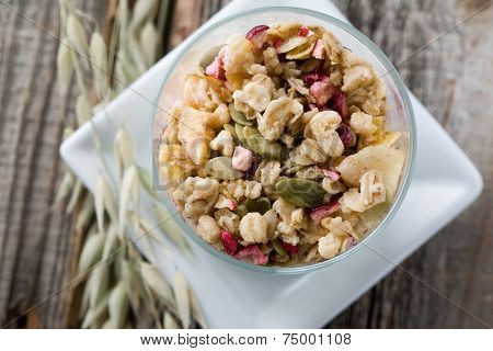 Healthy breakfast with yogurt and muesli, selective focus