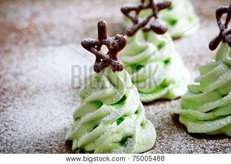 Close up of green christmas tree meringues