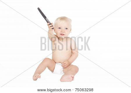 Young boy with comb