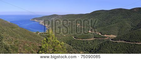 Beautiful panorama of winding mountain road to the bay