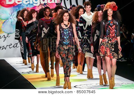 NEW YORK - FEBRUARY 12: A model walks the runway at the Desigual Fall/Winter 2015 collection during Mercedes-Benz Fashion Week in New York on February 12, 2015.