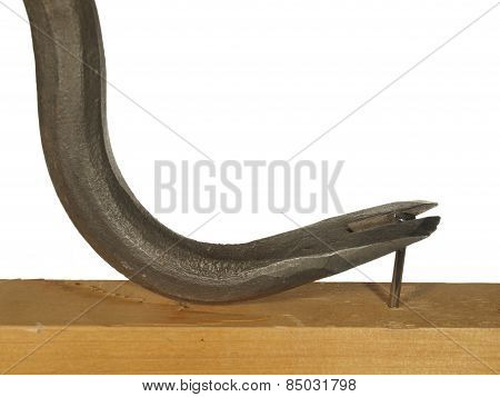 Steel Nail Puller To Pull Out A Nail Isolated On White Background.