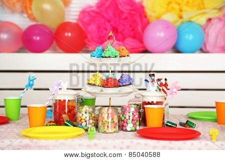 Prepared birthday table with sweets for children party