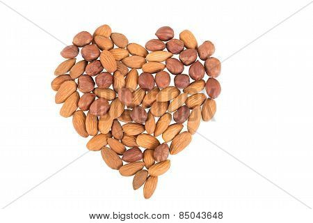 Almonds In The Form Of Heart Isolated On White Background