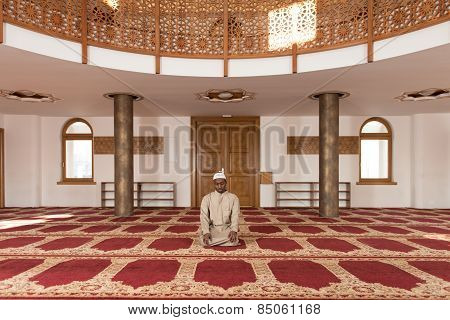 African Muslim Man Praying At Mosque
