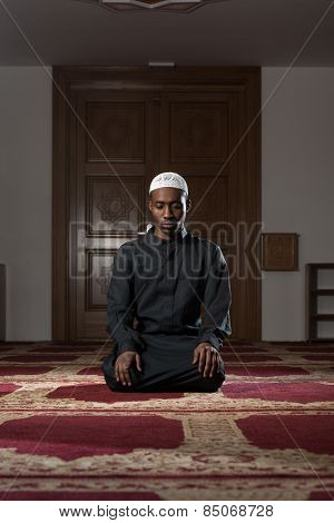 Young African Muslim Guy Praying