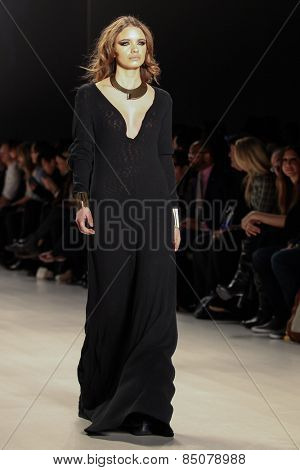 NEW YORK - FEBRUARY 13: A model walks the runway at the Mark & Estel Fall/Winter 2015 collection during Mercedes-Benz Fashion Week in New York on February 13, 2015.