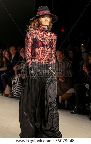 NEW YORK - FEBRUARY 13: A model walks the runway at the Mark & Estel Fall/Winter 2015 collection during Mercedes-Benz Fashion Week in New York on February 13, 2015.