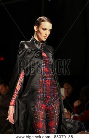 NEW YORK - FEBRUARY 13: A model walks the runway at the Mark & Estel Fall/Winter 2015 collection during Mercedes-Benz Fashion Week in New York on February 13, 2015.