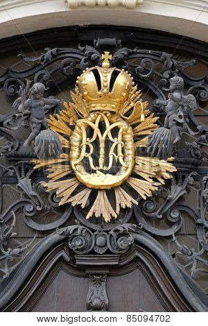 GRAZ, AUSTRIA - JANUARY 10, 2015: Our Lady monogram on the main entrance, Mariahilf church in Graz, Styria, Austria on January 10, 2015.