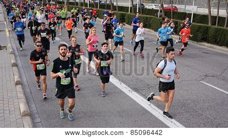 VALENCIA, SPAIN - MARCH 1, 2015: Runners compete in the III 15K Valencia Abierta al Mar run in the streets of Valencia.