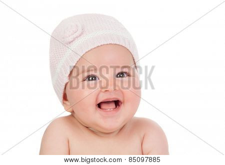 Adorable baby girl with wool hat lookin up isolated on a white background
