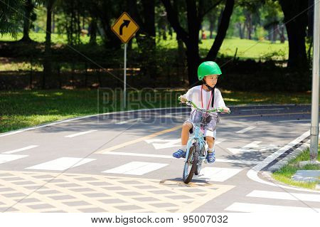 Boy Practice Biking On The Road
