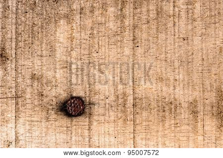 Old And Vintage Rust Nail On Grunge Hard Wood