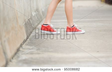 Focus On Girl In Red Shoe