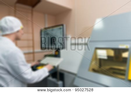 Production of electronic components  at high-tech factory blur b