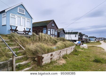 Lovely Beach Huts On Sand Dunes And Beach Landscape