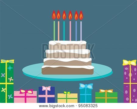 Birthday cake with candles and boxes from gifts