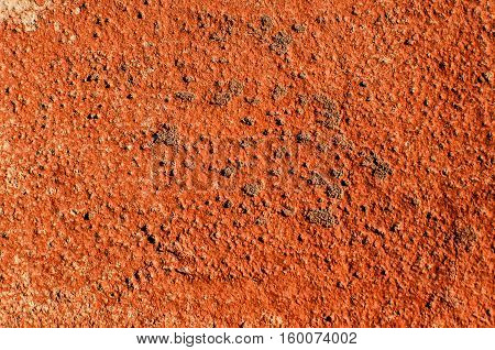 Texture of wall painted with red lead