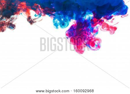 Color drop underwater creating a silk drapery. Ink swirling underwater. Cloud of colorful ink