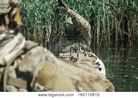 Special forces operators in the military kayak