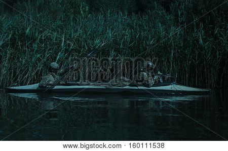 Special forces operators in the military kayak
