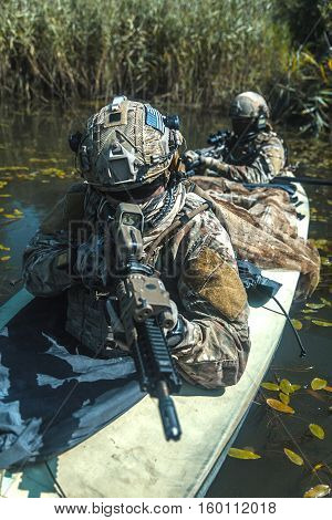 Special forces operators in the military kayak