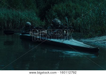 Special forces operators in the military kayak