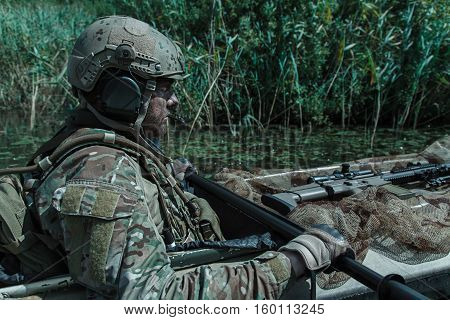 Special forces operators in the military kayak