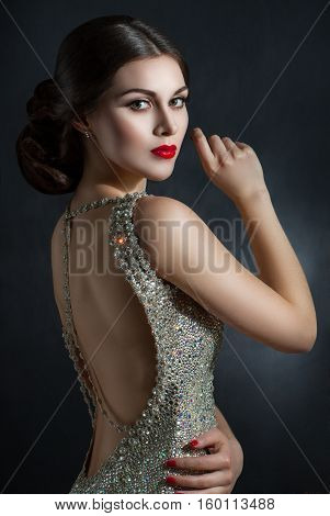Beautiful Young Woman In An Evening Dress Crystal. Perfect Beauty, Red Lips, Bright Makeup. Twinklin