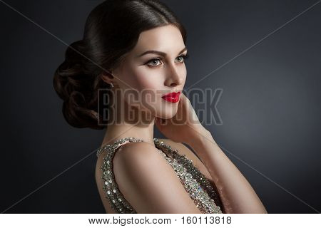 Beautiful Young Woman In An Evening Dress Crystal. Perfect Beauty, Red Lips, Bright Makeup. Twinklin