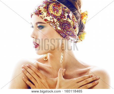 young pretty modern girl with bright shawl on head emotional posing isolated on white background, asian people ethnicity