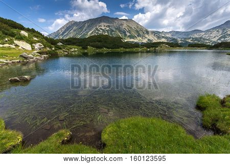 Todorka Peak and reflection in Muratovo lake, Pirin Mountain, Bulgaria